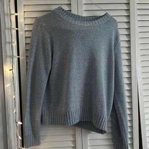 light blue sweater
